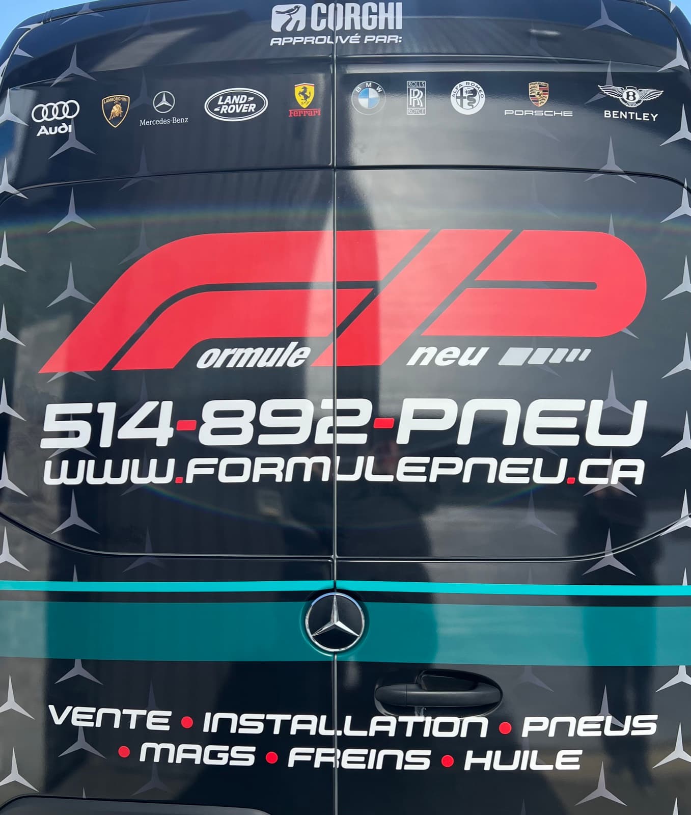 Rear panel branding with phone number and services